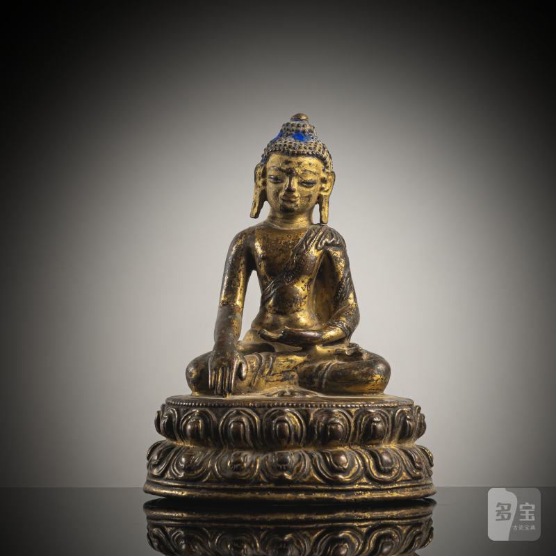 A GILT-COPPER FIGURE OF BUDDHA SHAKYAMUNI